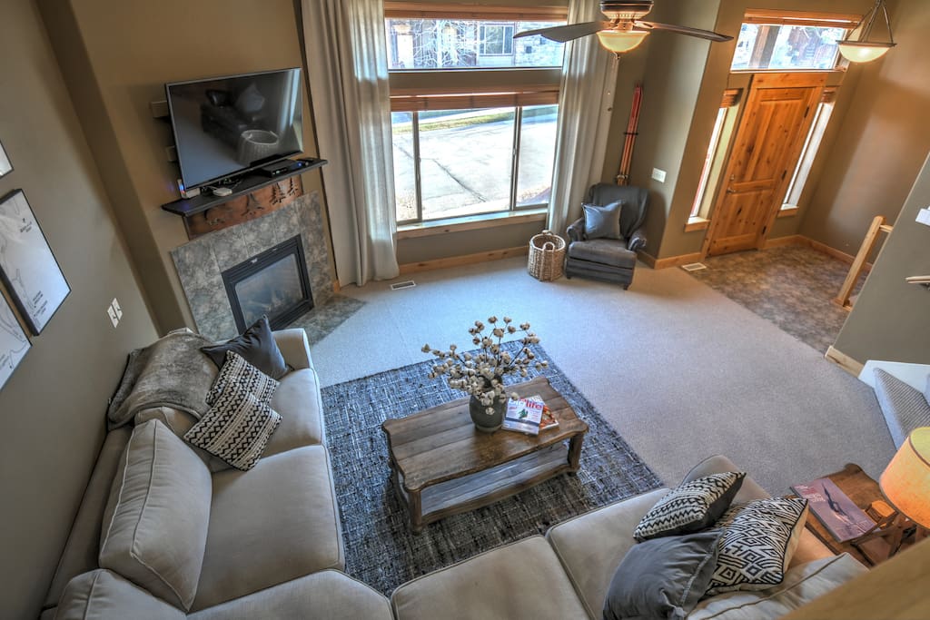 Main Level Living Area with TV and Gas Fireplace