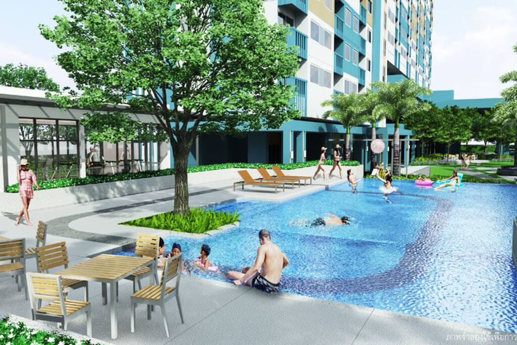 Swimming pool and nice gym in front of the building