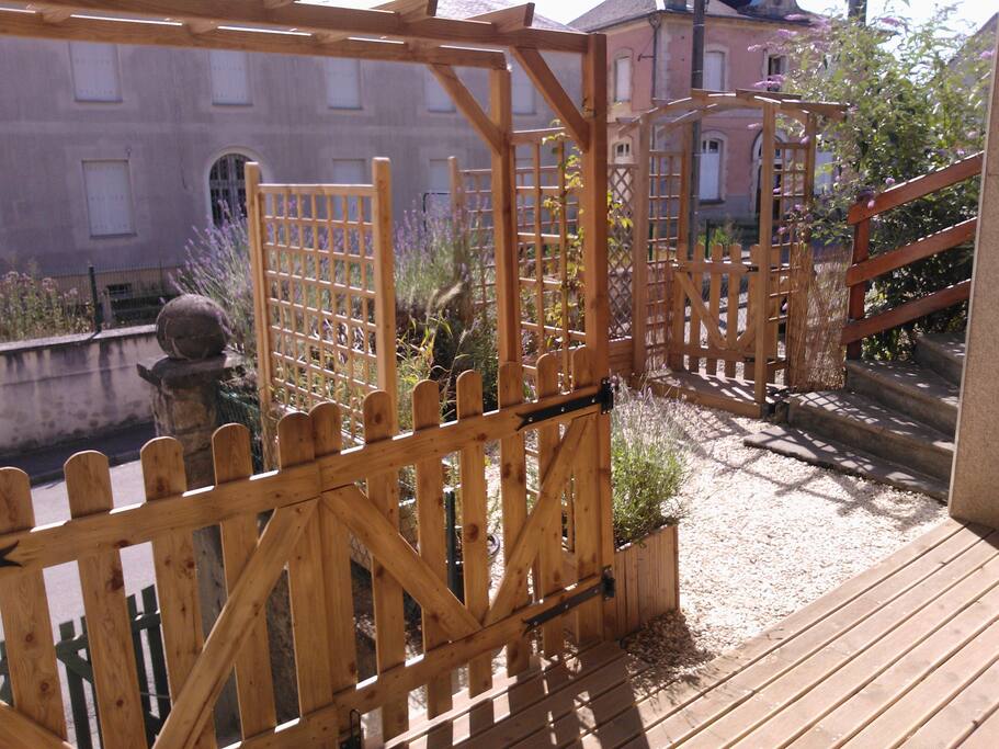 Sunny private terrace. Also has covered dining area