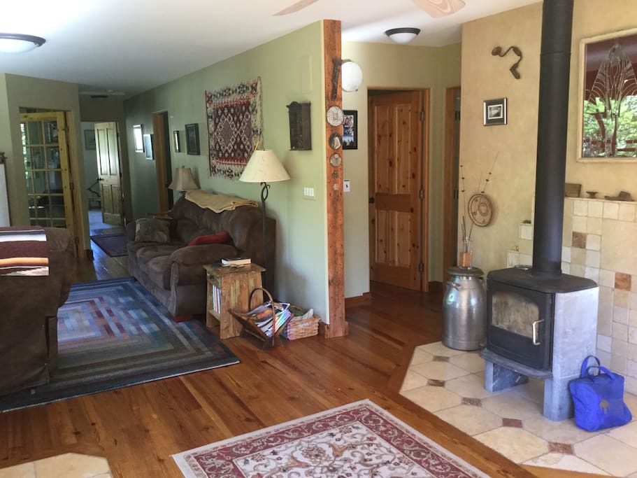 Wood stove and part of living room