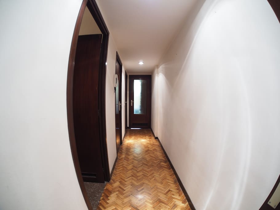 Hallway.
First door is the guest room, then you have the kitchen and the last one is the exclusive water closet for our guests.