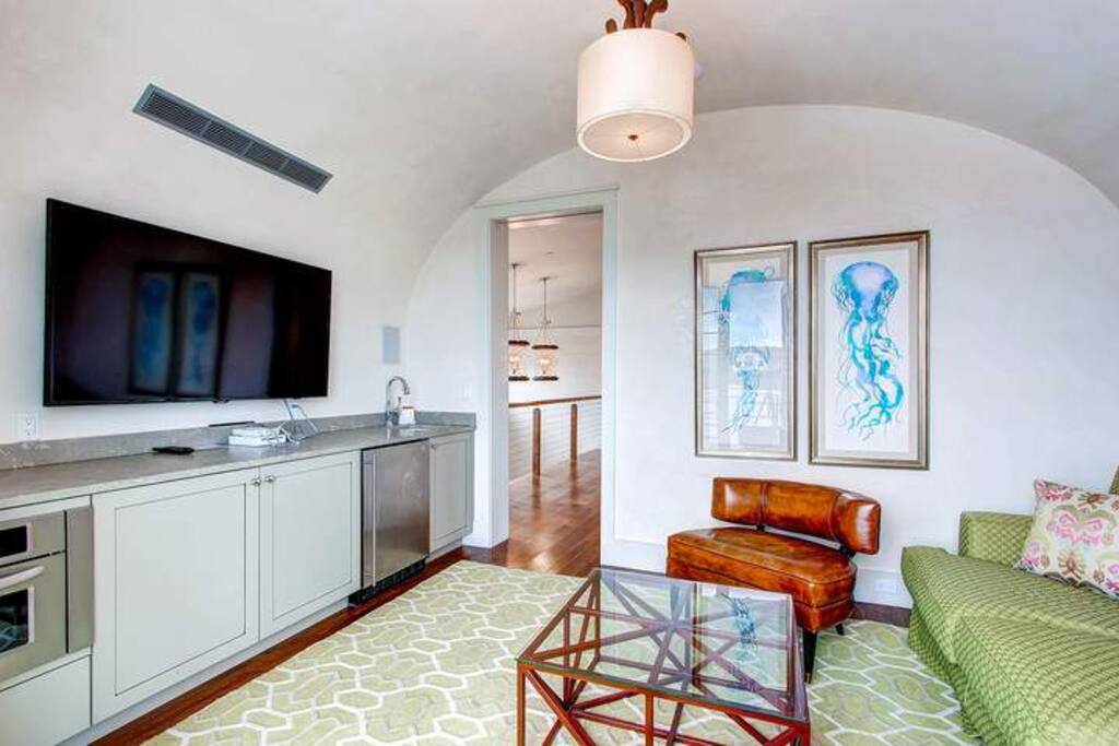 Enjoy movie night in your very own media room on the third floor