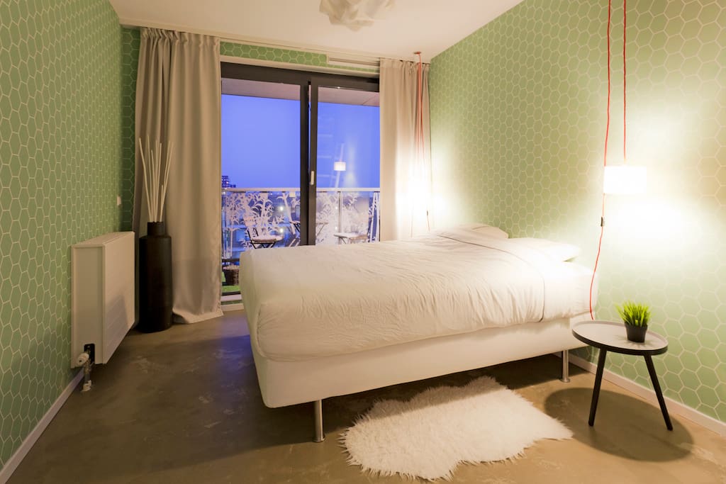 Calm bedroom with balcony
