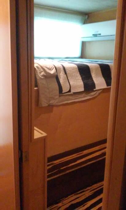 You climb up in to bed and there is low clearance overhead