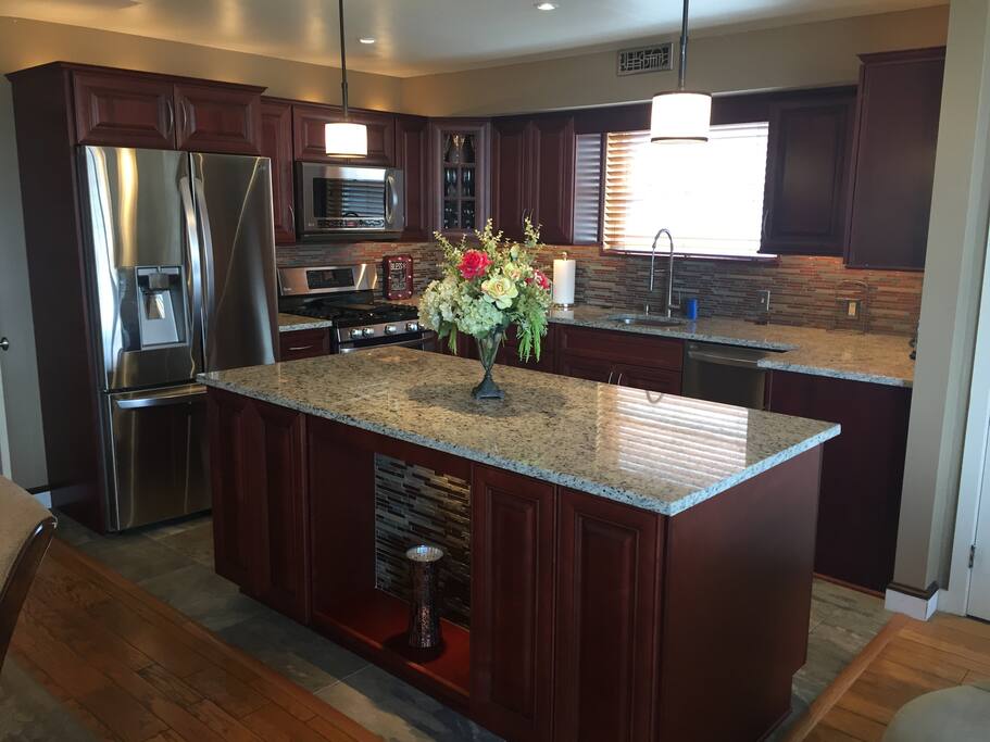 Brand New Kitchen with stainless steel appliances & granite counters.