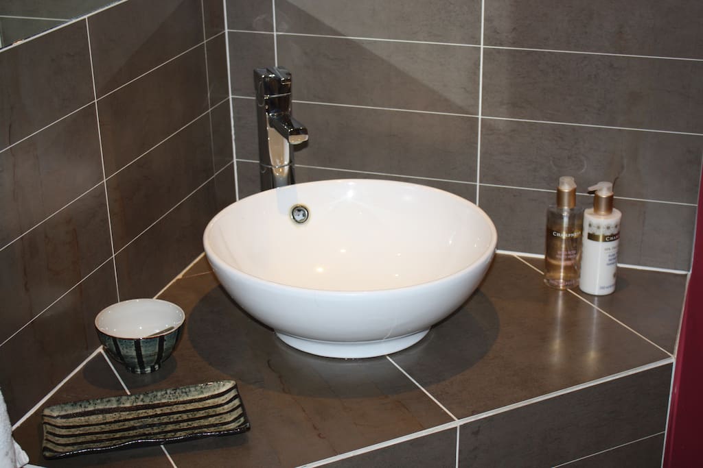 Bathroom with bath and shower