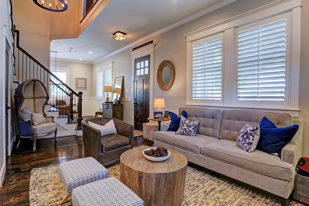 Open living room w/ 60" TV and surround sound