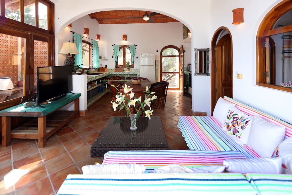 Penthouse apartment is open-air with loft- style living area and open kitchen.