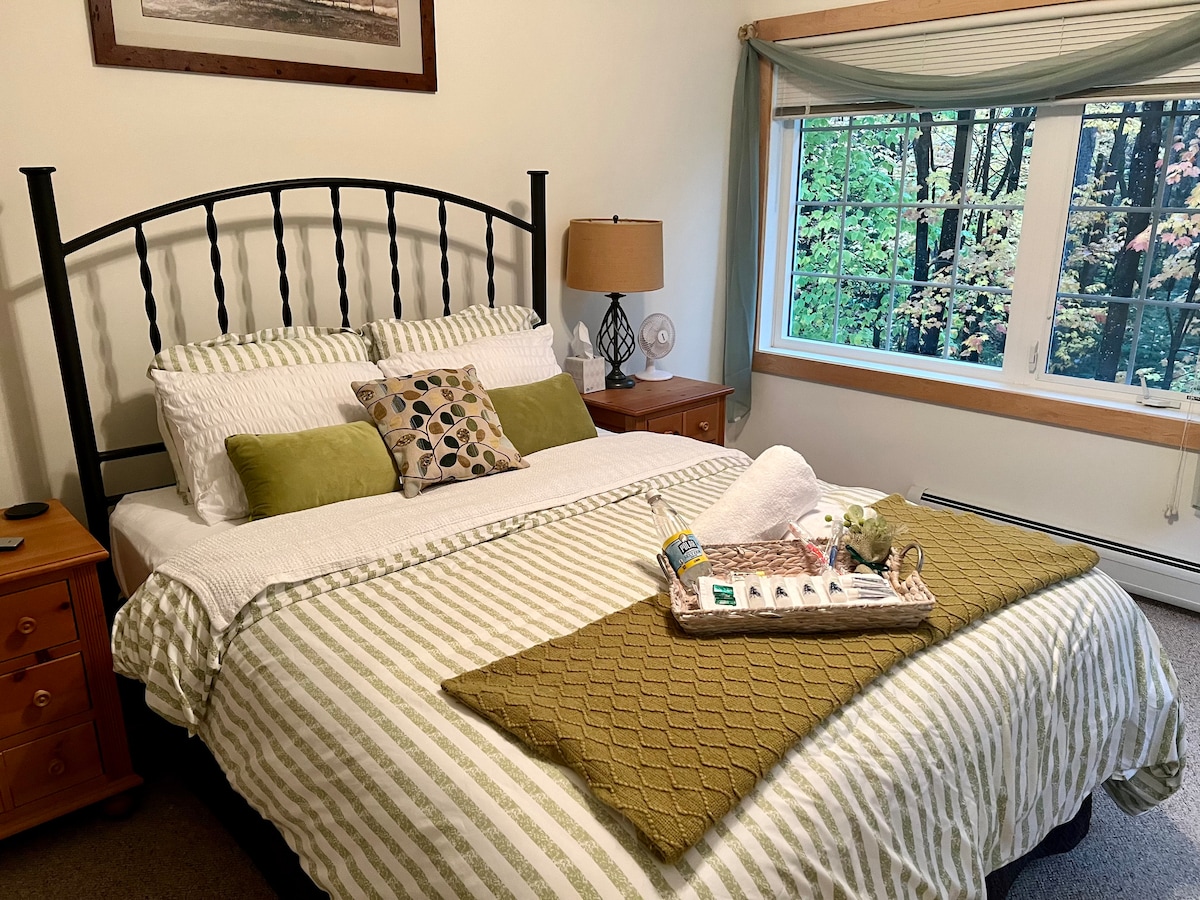 The vitality of Vermont in the summer inspired our master bedroom. 