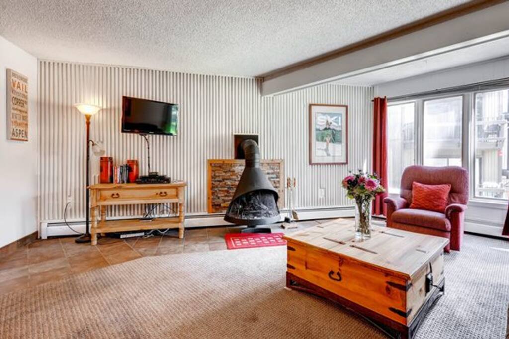 Cozy up to the wood burning fire place.
