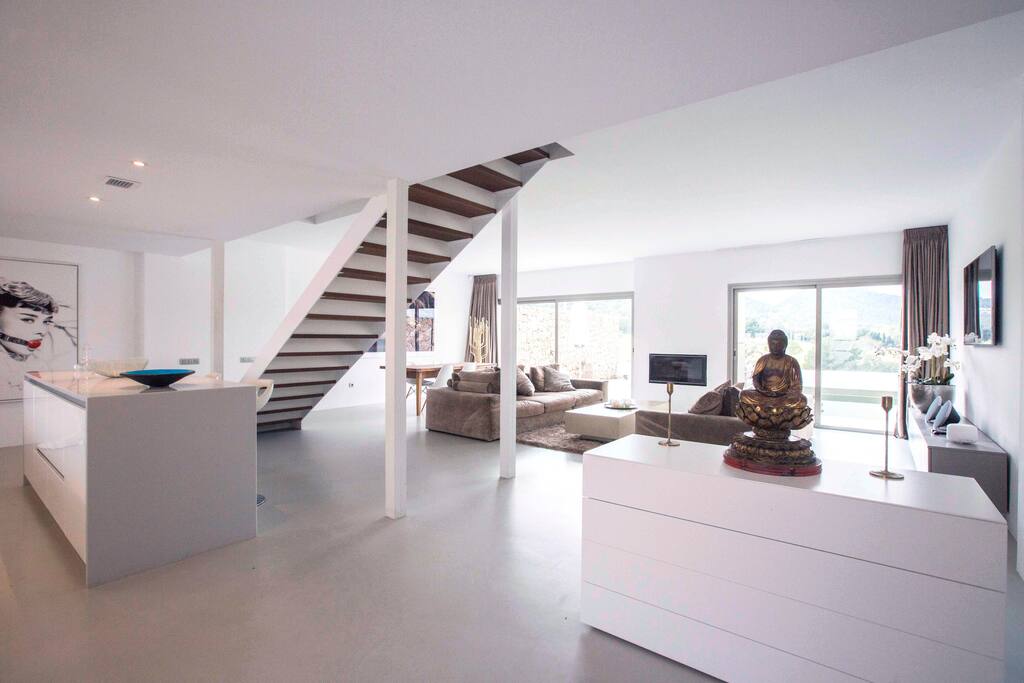 Open plan living and dining, opening directly onto terrace (his is a photo of old furniture and layout)