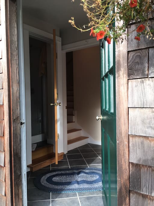 Entry hall, bath, stairs to loft.