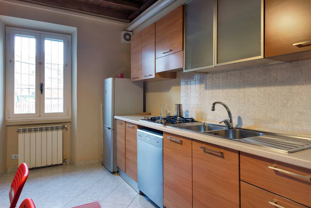 The new & equipped kitchen with dining table