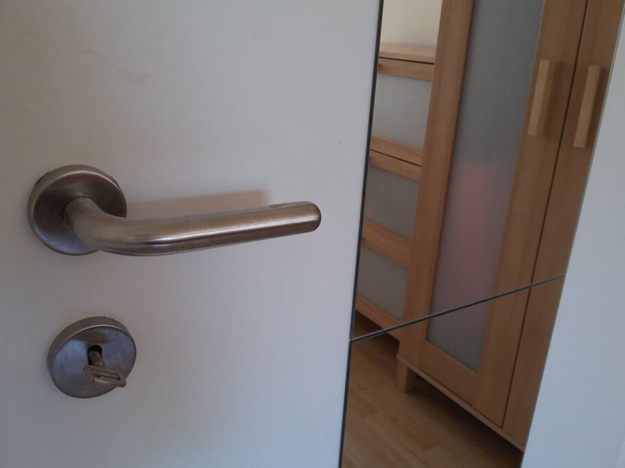 Not that your flatmates are dangerous, but whenever you have a better feeling with it, you can lock your room ;)