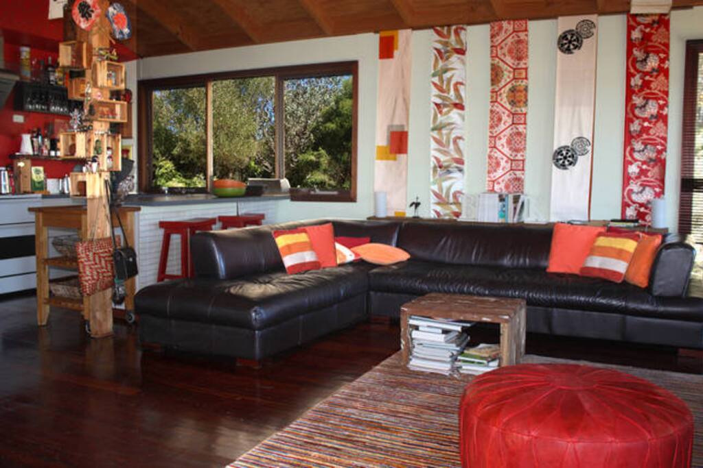 A super large leather couch that makes relaxing easy.