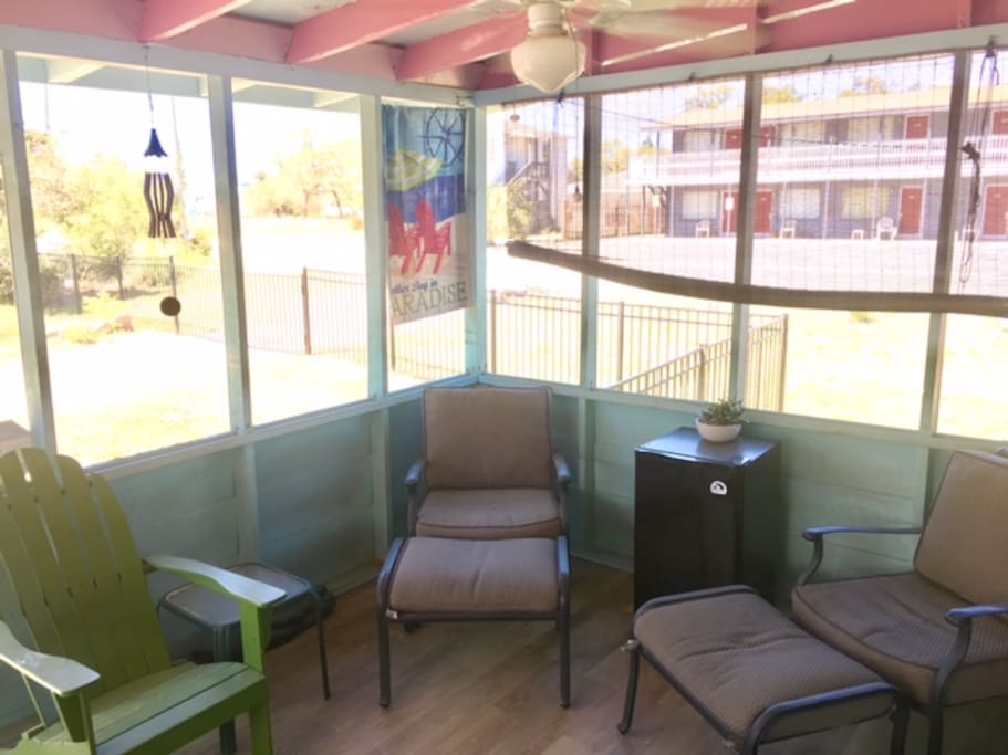 Relax on the screened in back porch