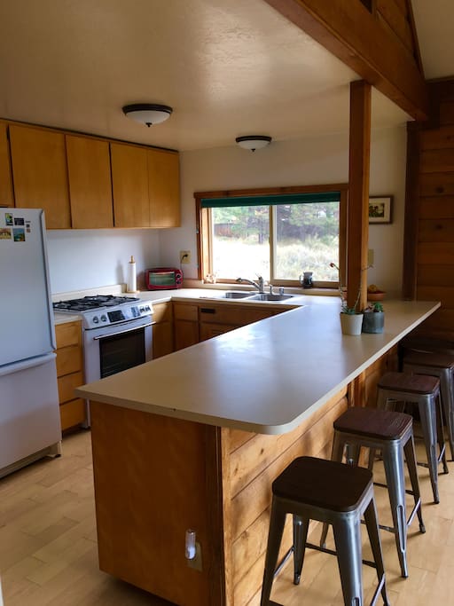 Kitchen with 4 counter stools