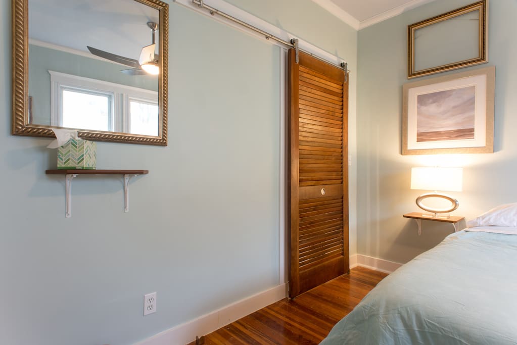 Sliding Asian-inspired doors to maximize the space.