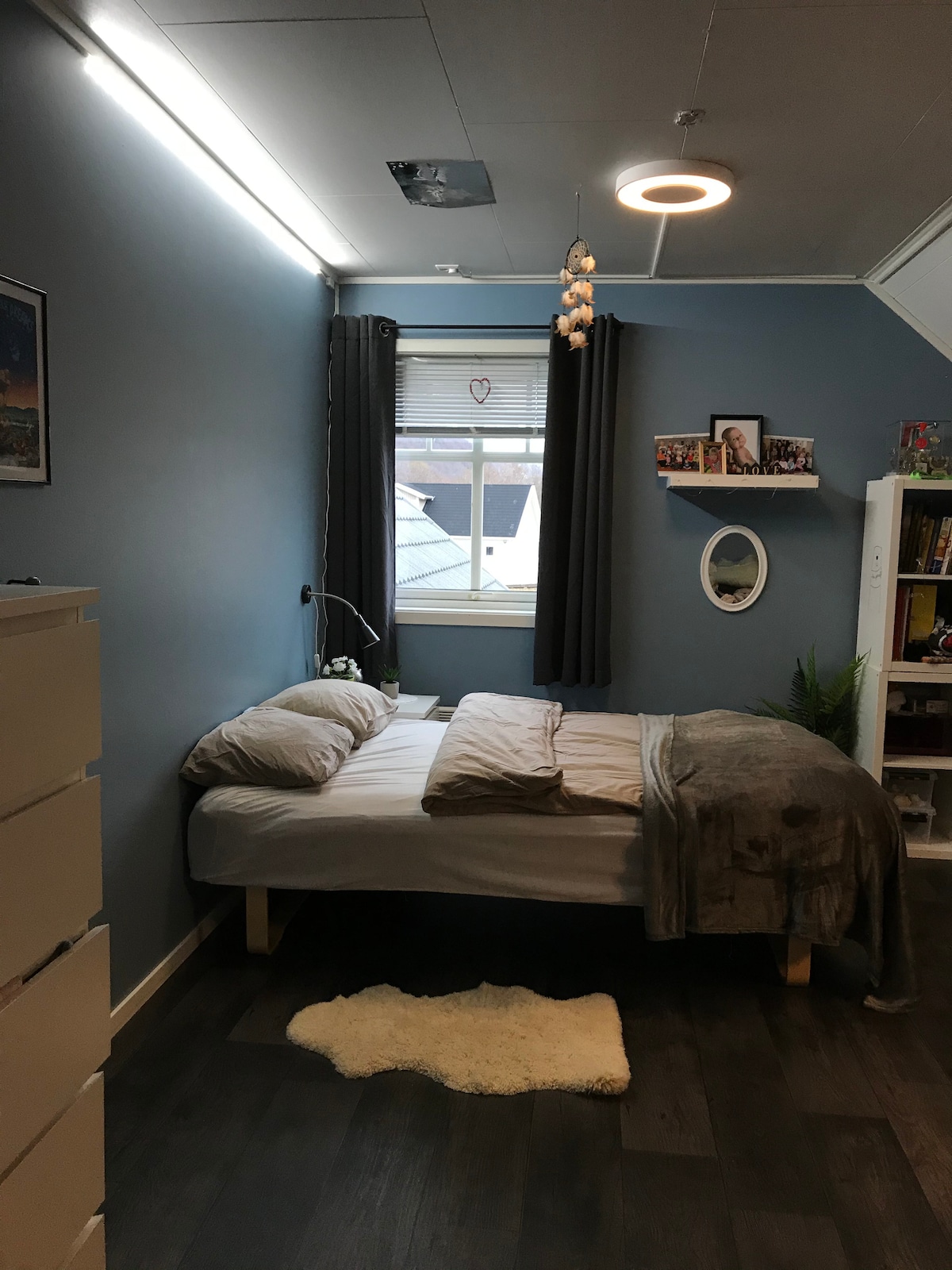 Small double bed 120 * 200.
1 seater sofa and table on the opposite side.
There is plenty of room for both 1 and 2 extra beds if desired.