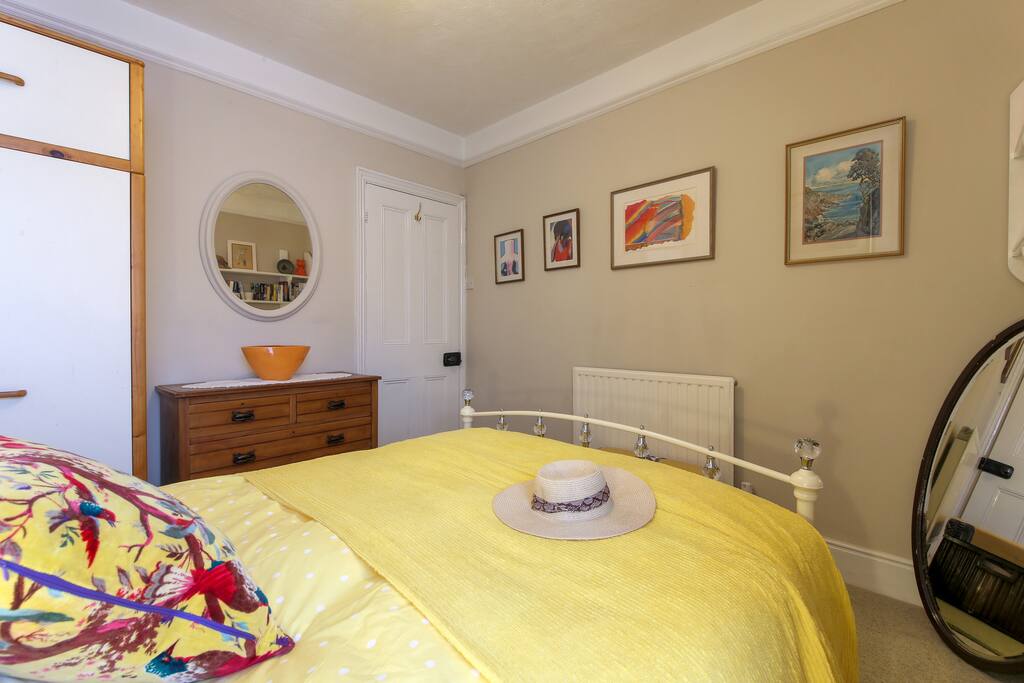 Guests have a wardrobe and set of drawers in this room.