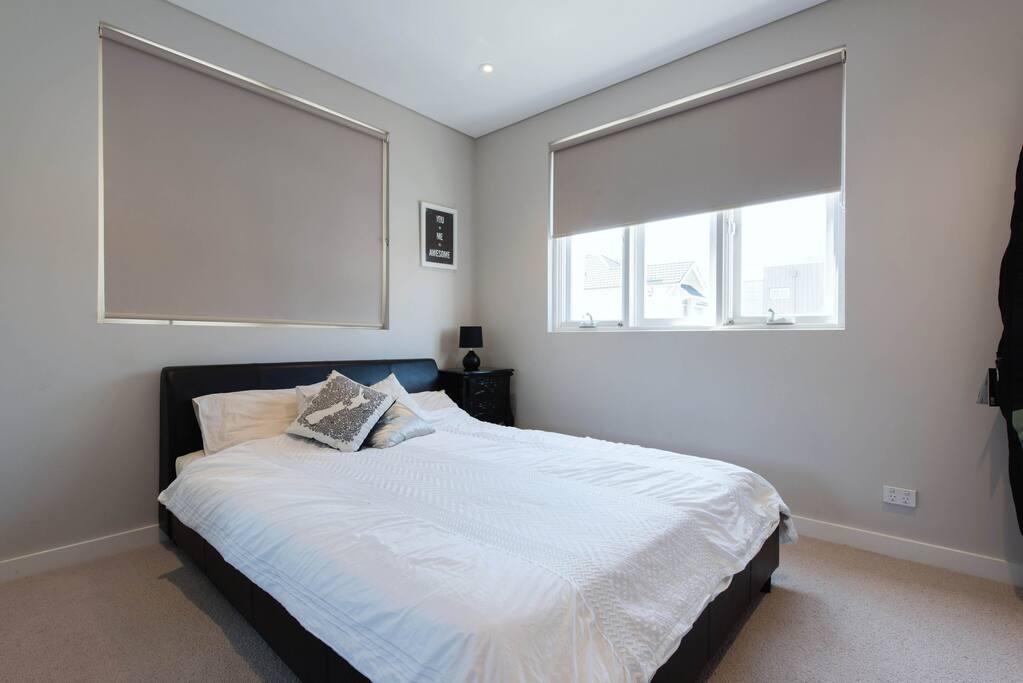 Master bedroom with queen sized bed.