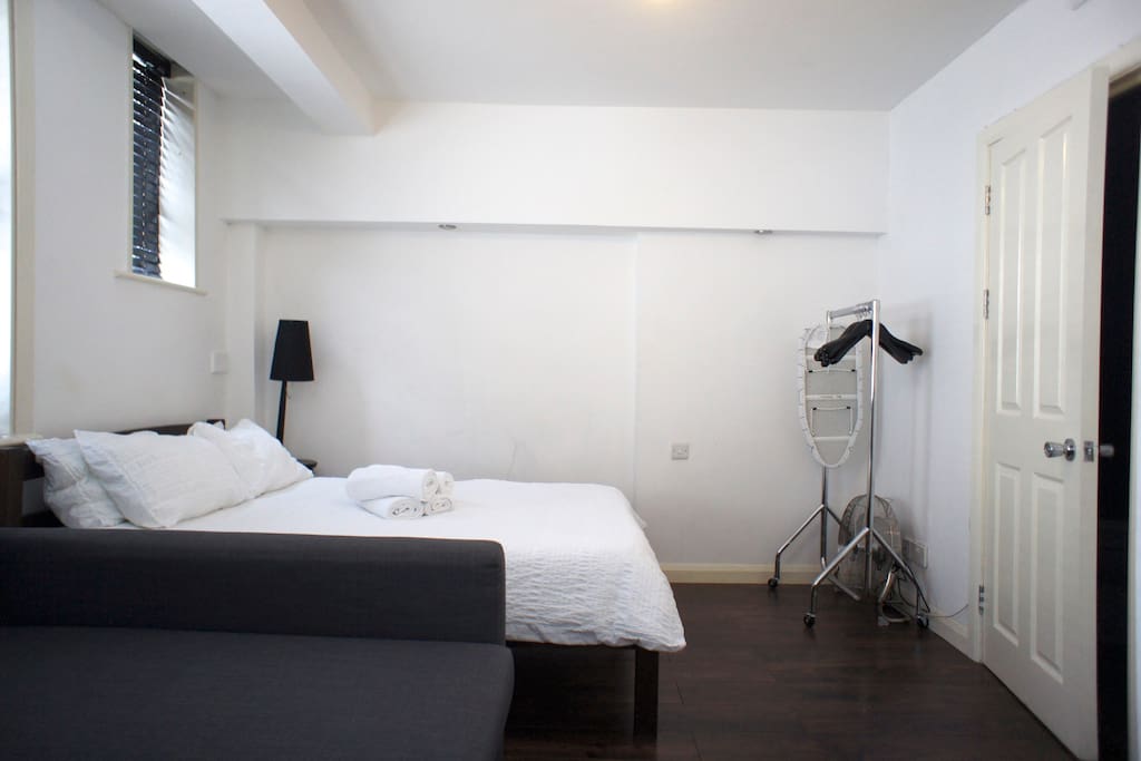 Here's your studio with double sofa-bed