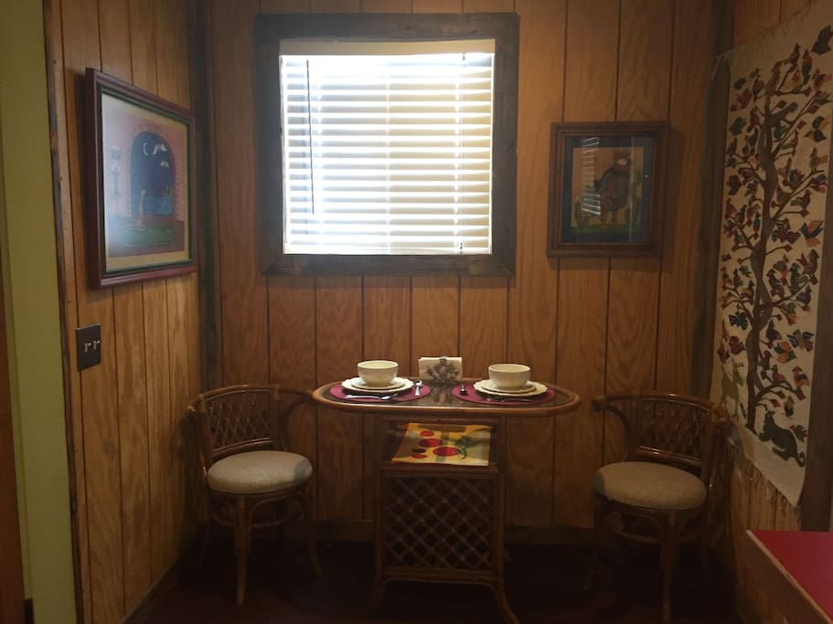 Seating for two at the mid-century bent bamboo dining table.