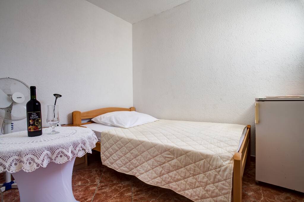 It has a cozy single bed, fridge, TV with cable, WI FI connection..