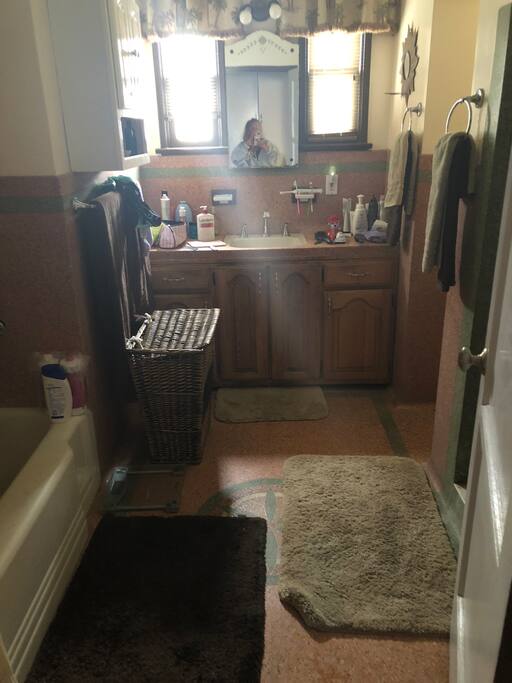 Main bathroom with shower and bath