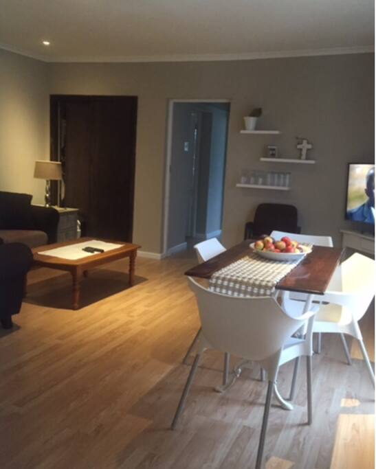 Comfortable lounge / dinning room . Full DSTV Premium and Wifi