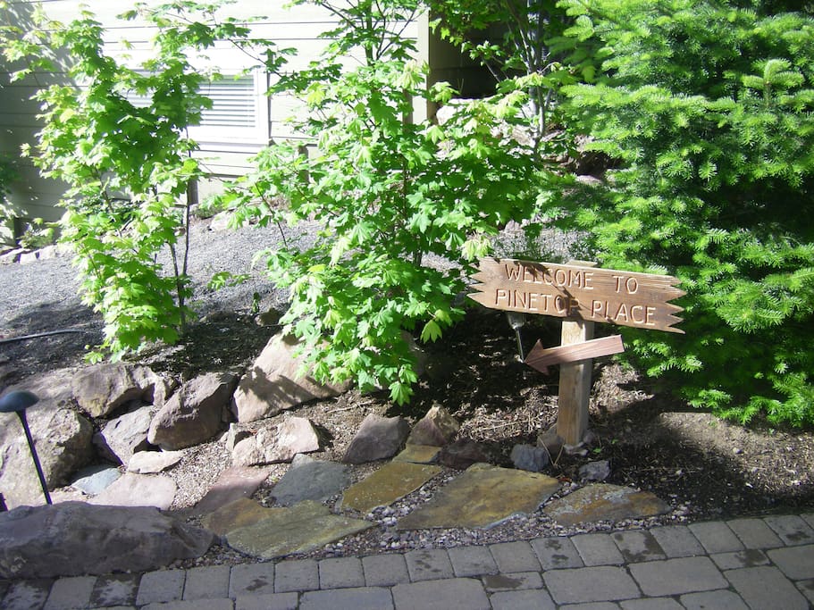 Garden-like stone path alongside the house.