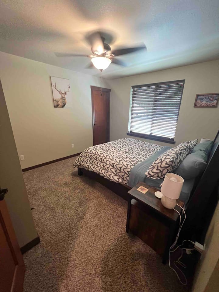 Master bedroom with the queen bed and en suite bathroom
