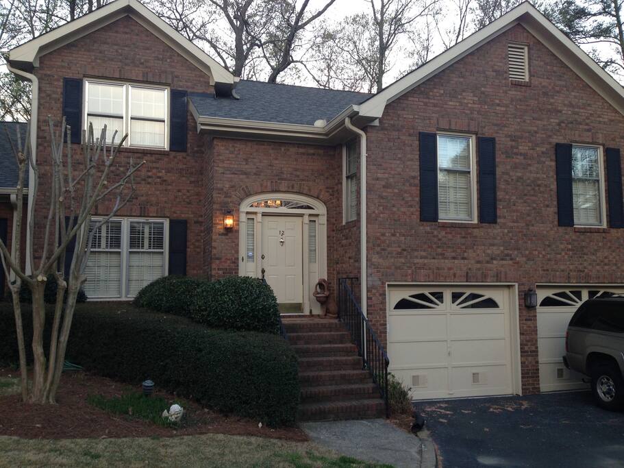 This is the townhouse. It's part of a small community of 36 homes in the wooded hills of Vinings.