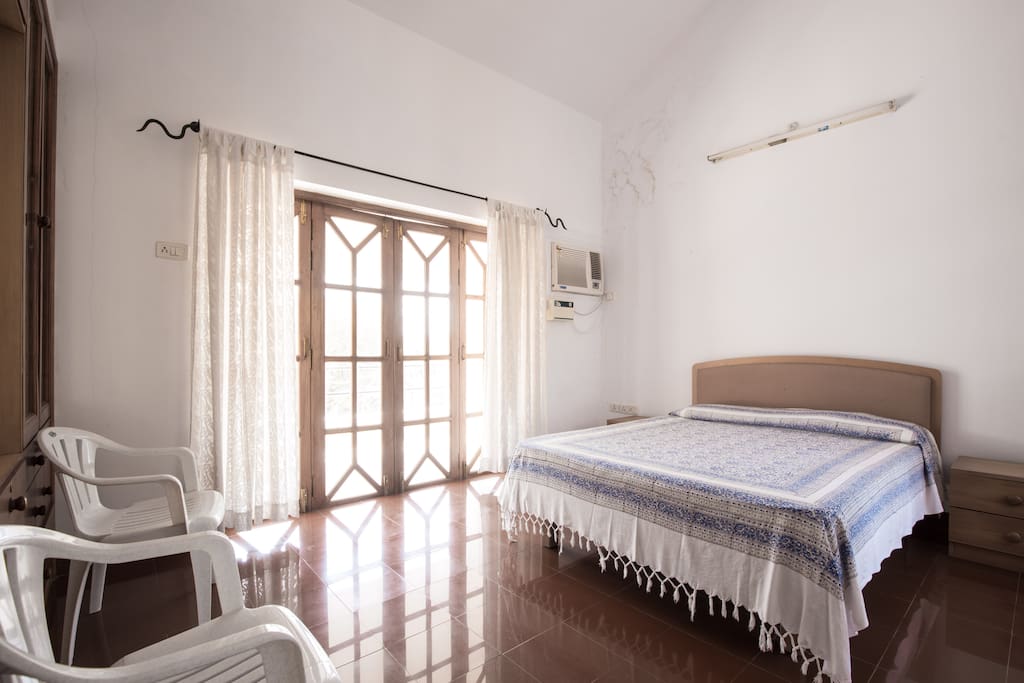 spacious master bedroom with large sit out.