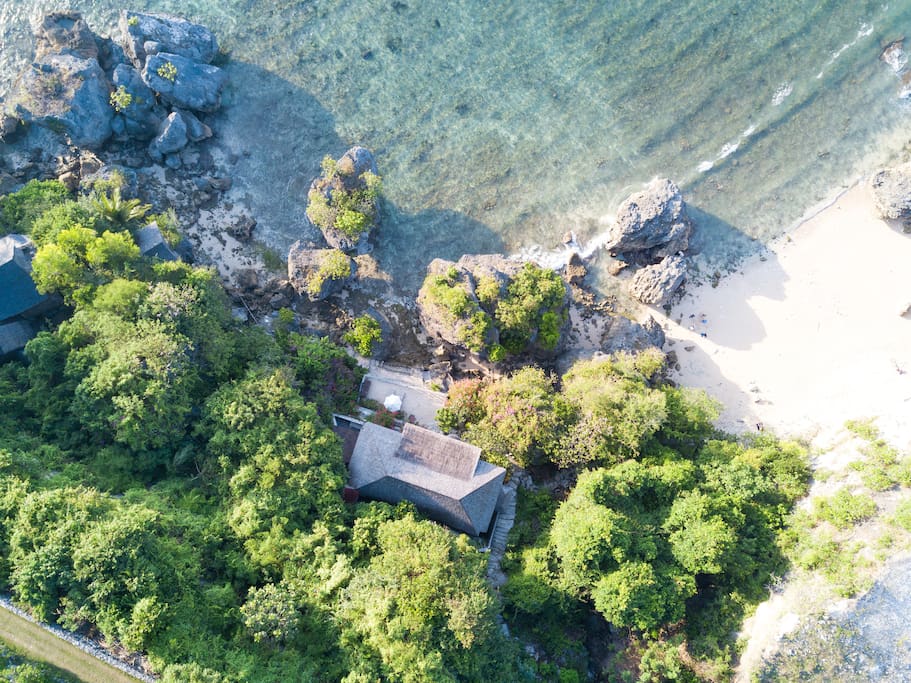 The private beach that is located just footsteps away