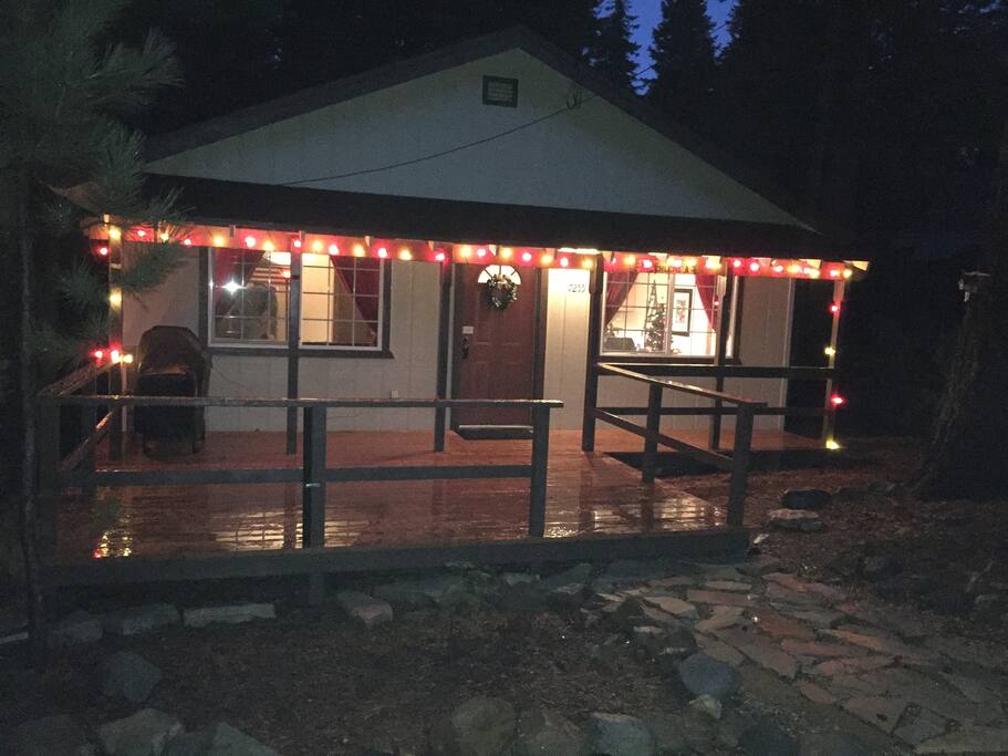 Front of cabin at Christmas.