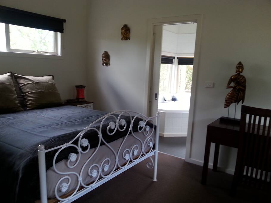 Bedroom with view of bathroom