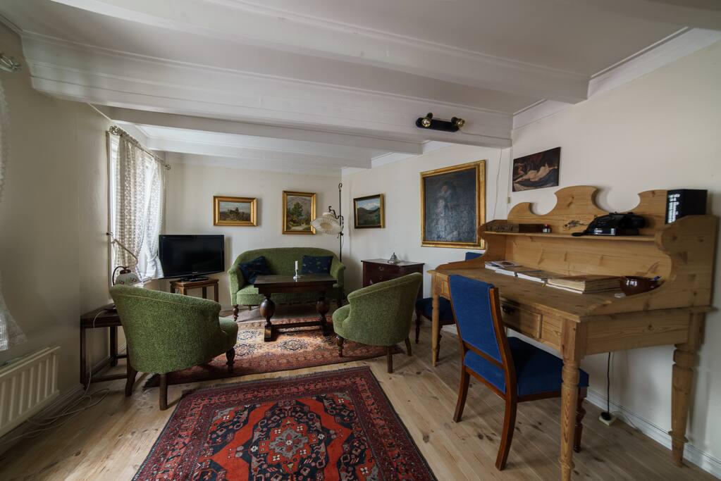 Livingroom with beautiful furniture. Perfect place to relax after a long day outside.
