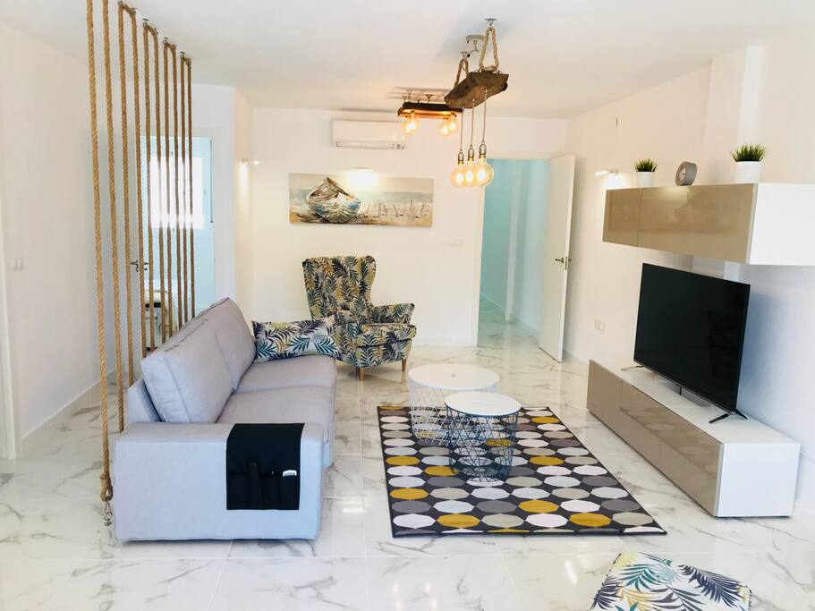 sitting area with large 3D TV
