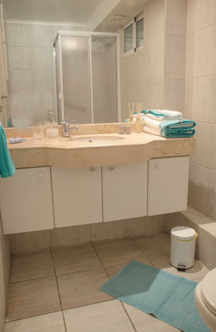 Private bathroom with showe
