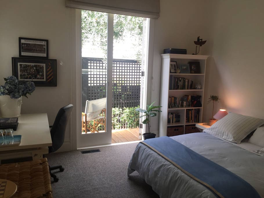 Bedroom with separate entrance and sunny outdoor private verandah.