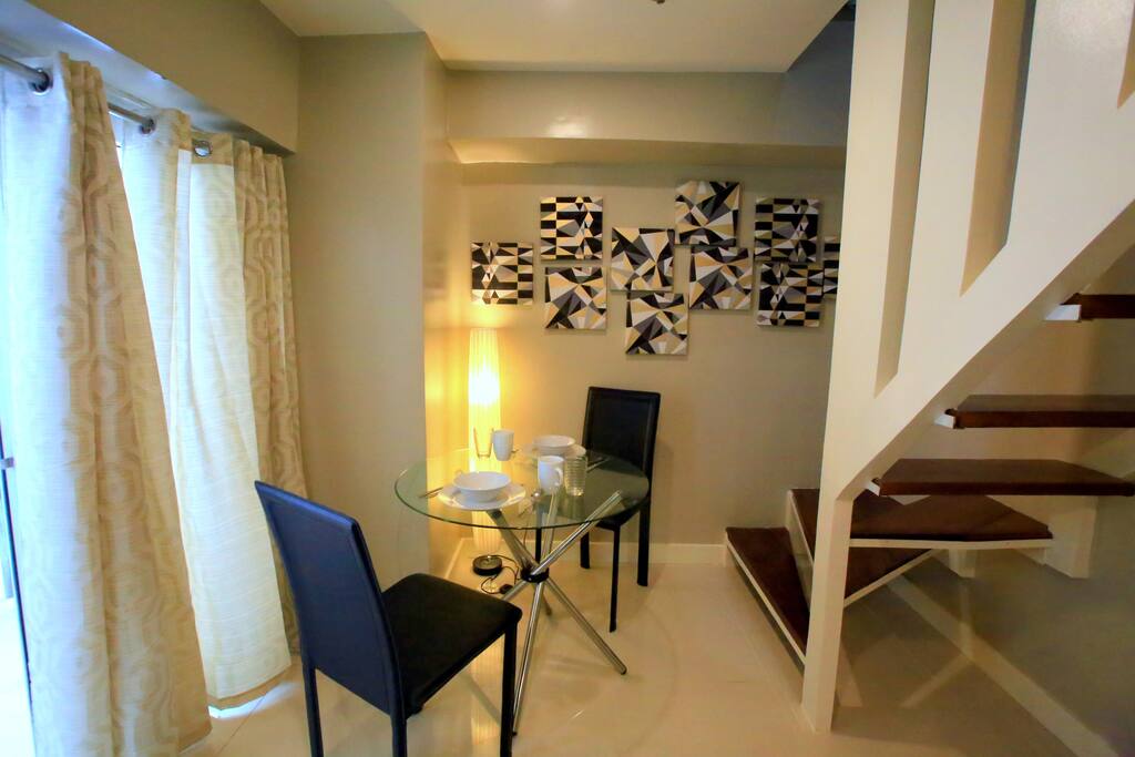 Dining area with extra chairs kept on the sides