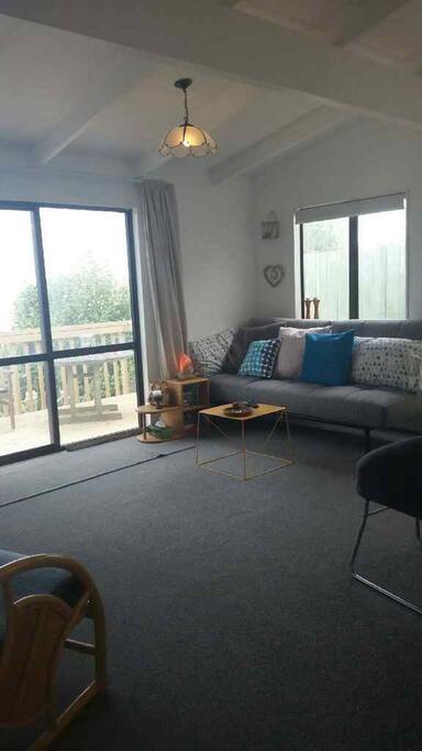 Apartment lounge area and double futon bed
