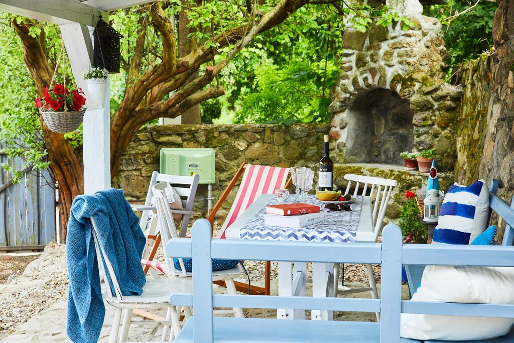 Covered terrace and fireplace