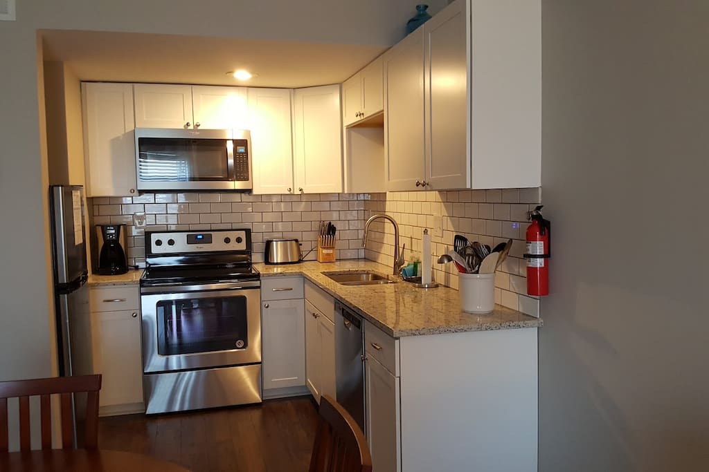 Kitchen has all appliances and is well-stocked for all your cooking needs.