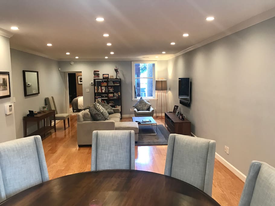 Dining table looks onto living room