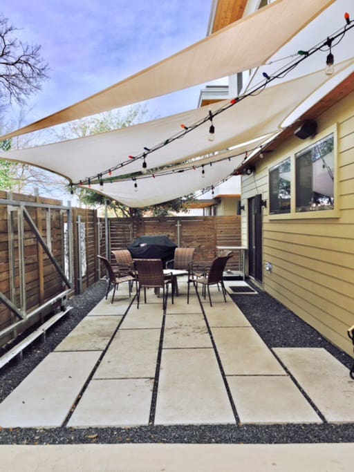 Great hangout space with sunshades and gas grill.
