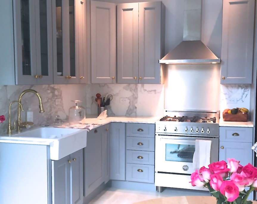 Freshly renovated gourmet kitchen w calacatta marble + Bertazonni range