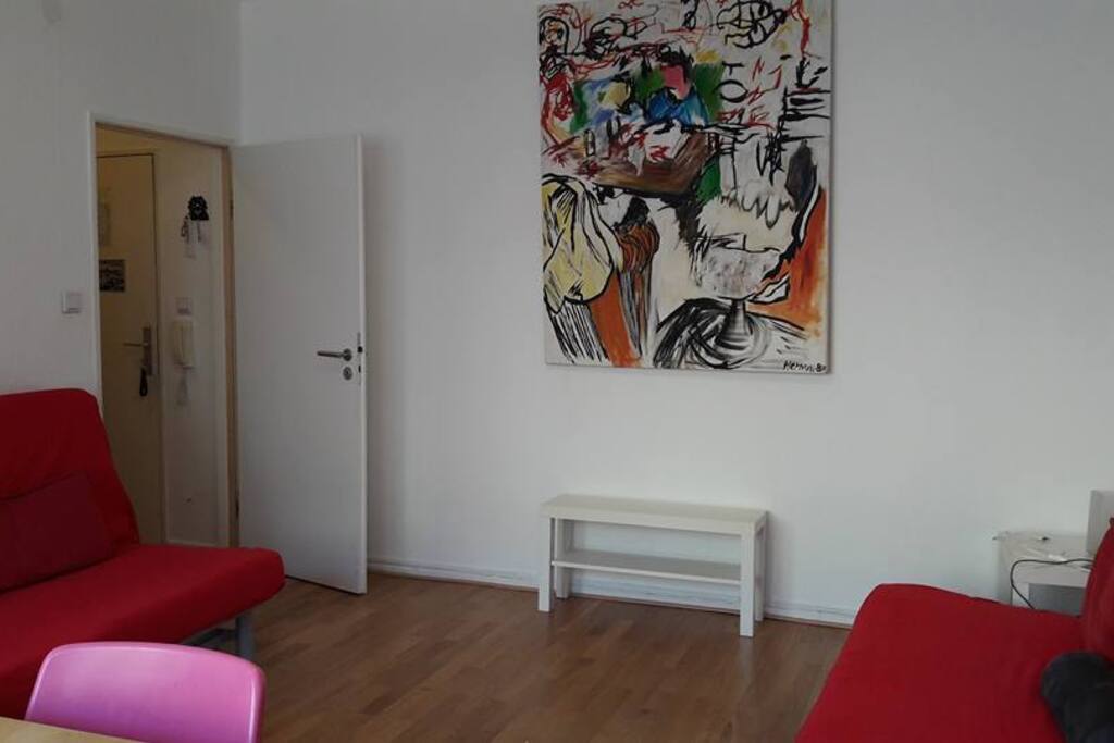 living room with two sofa/bed