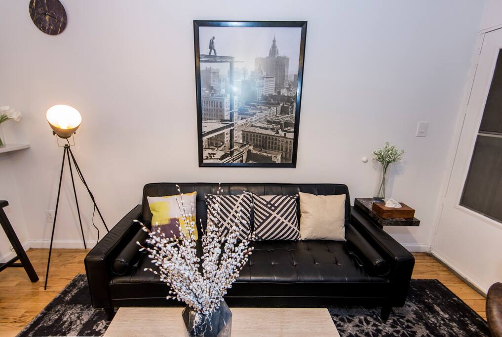 Stylish, spacious living room. Pull-out couch can sleep 2 comfortably